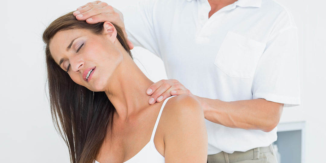 Woman getting chiropractic adjustment